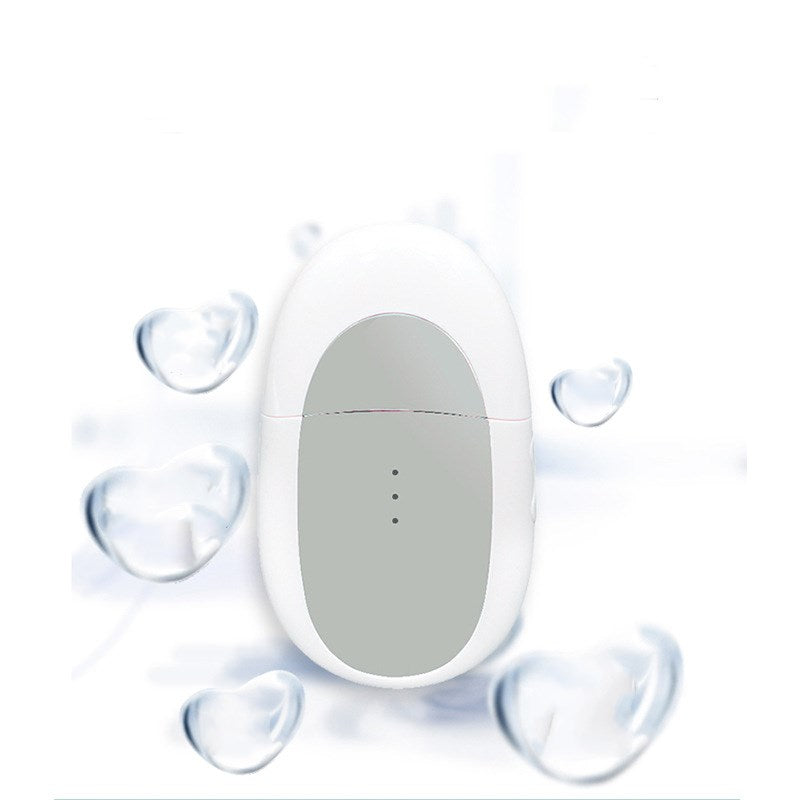 Dewspell Warm Eye Reset Massager — rounded warming head detail