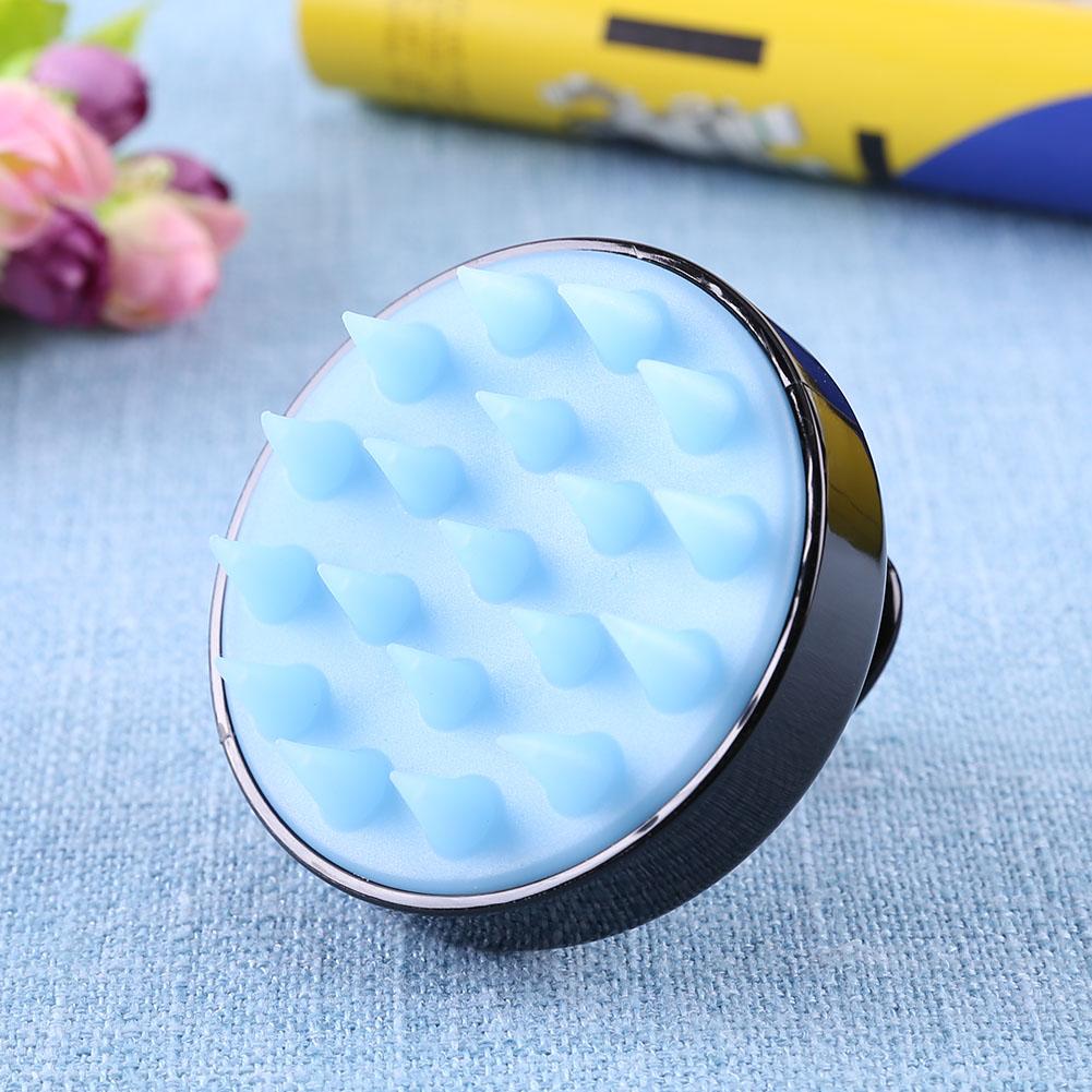 Close-up of the soft silicone massage bristles on the Dewspell Scalp Reset Brush