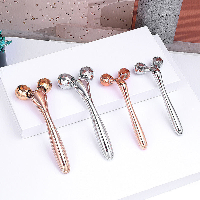 Dewspell Cooling Rose Quartz Facial Roller — silver finish