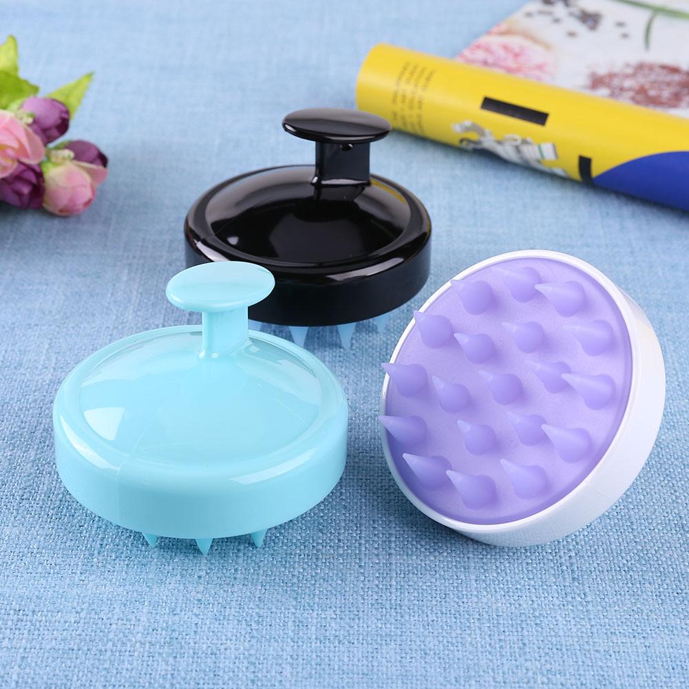 Dewspell Scalp Reset Massage Brush with ergonomic top handle and soft bristles