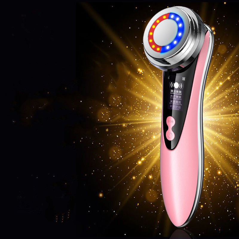 Dewspell Face & Neck Glow Wand — curved massage head detail