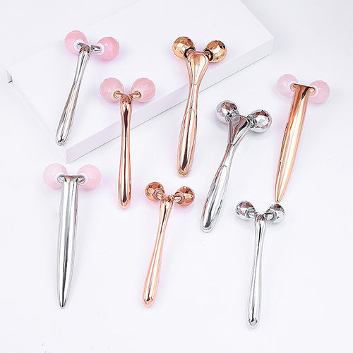 Dewspell Cooling Rose Quartz Facial Roller — twin-wheel product view